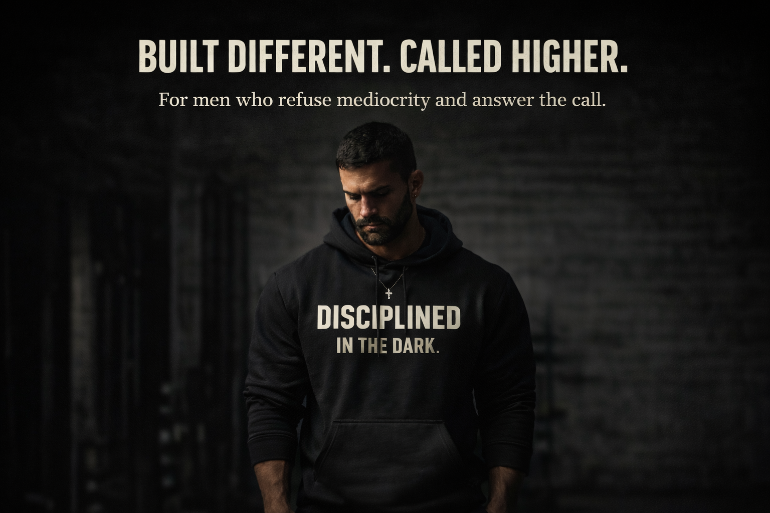 Man wearing a black hoodie with text, standing against a dark background with motivational quote above.